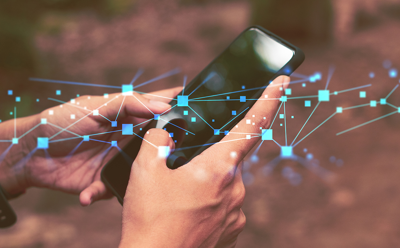 woman using smartphone network for gps maps, Technology, Media & Telecommunications | DXC Technology Customer Story
