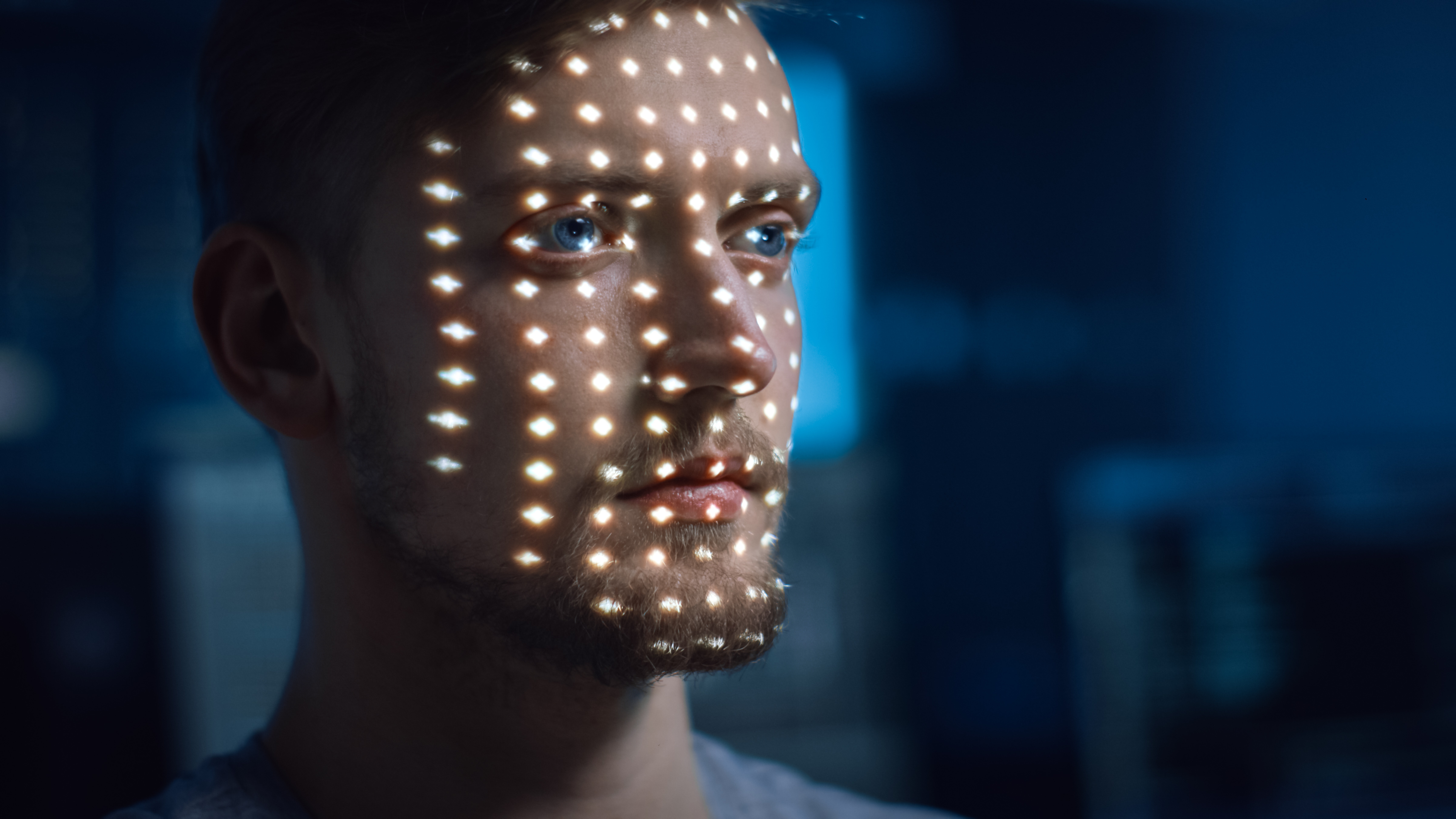 Man’s face being scanned for secure digital identity and verified online access, Zero trust solutions | DXC Technology