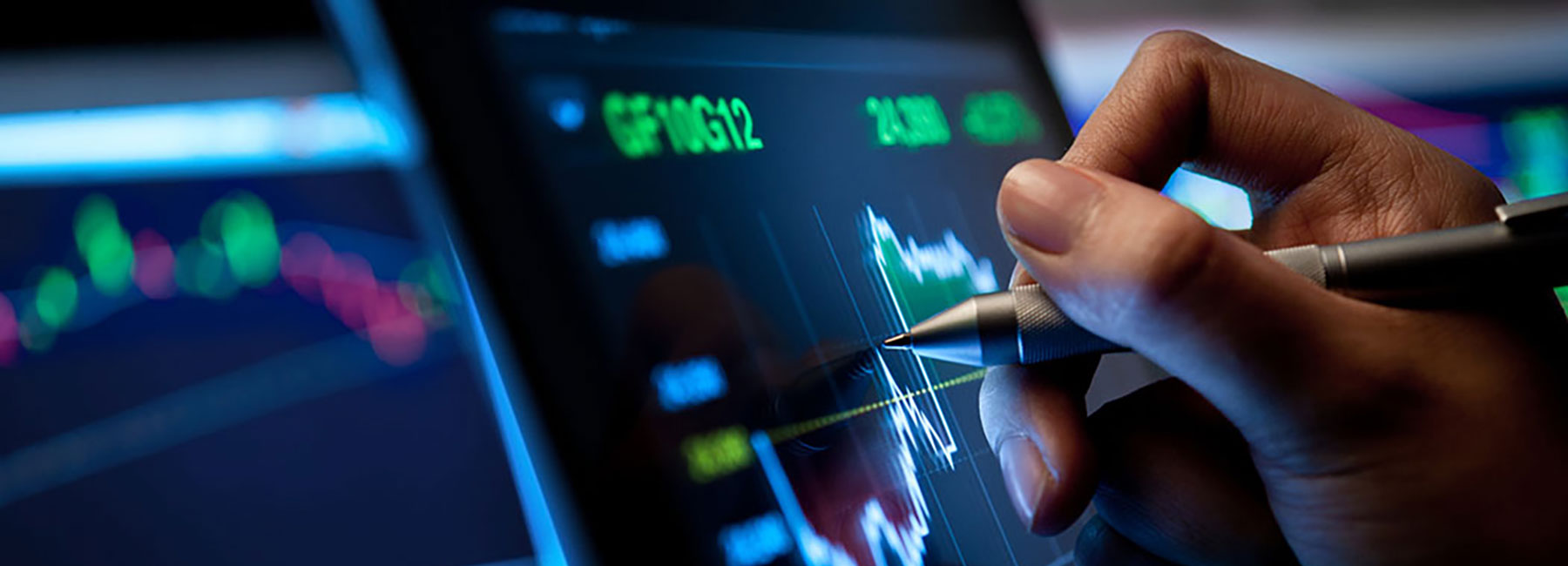Person writing on chart on tablet, Cloud & Infrastructure | DXC Technology Insights
