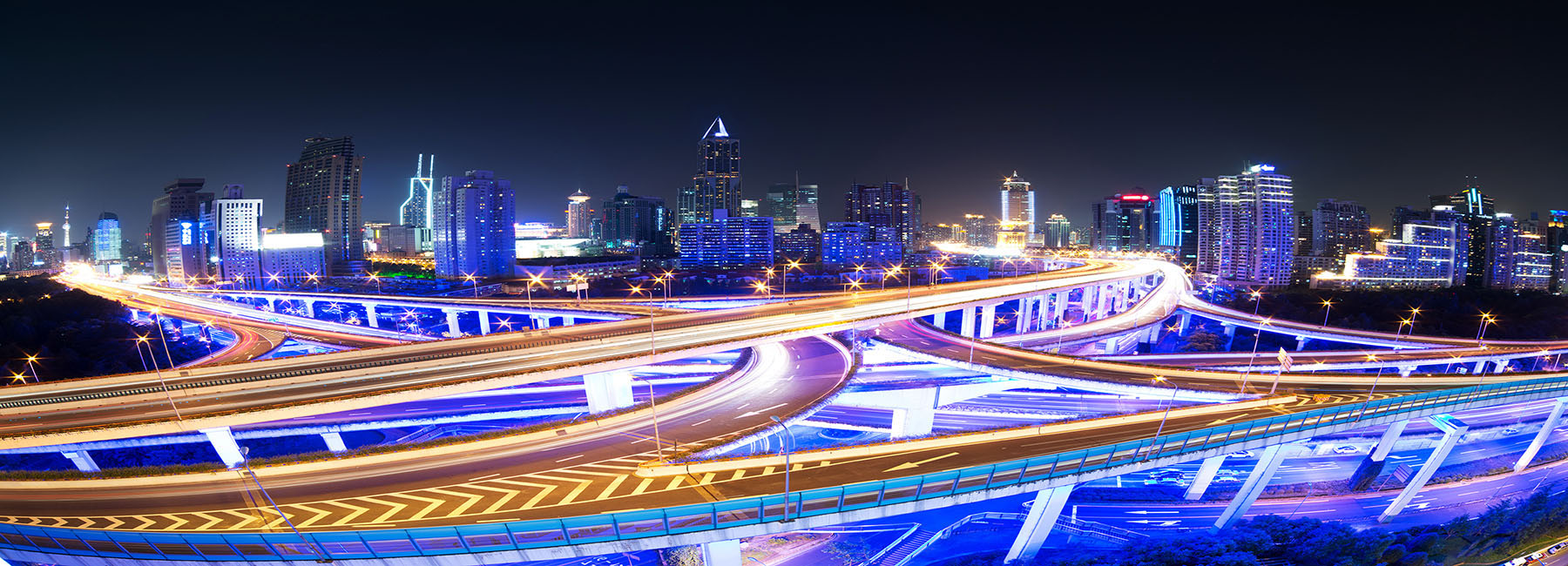 neon-lit highways and cityscape, Cloud & Infrastructure | DXC Technology Insights