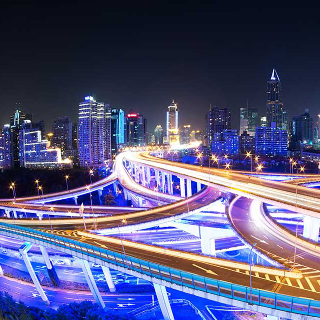 Night view of a modern city with skyscrapers and highways, Private, Hybrid & Multicloud, HPE | DXC Technology