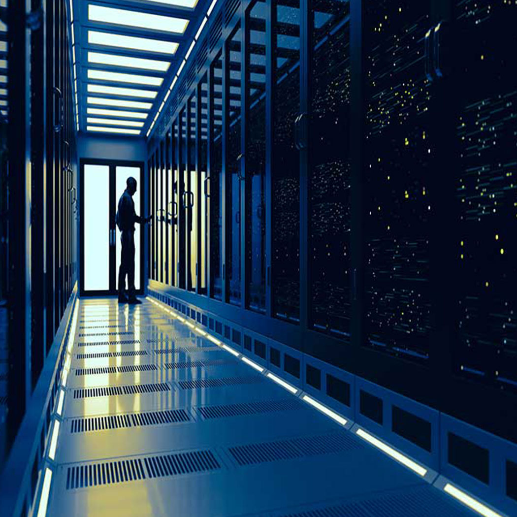 Person checking status of data center systems, Infrastructure, App & Data Protection | DXC Technology