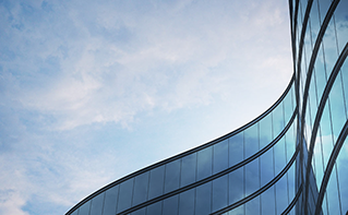 glass building and sky, Large Australian insurance organization, Contact Center Experience | DXC Technology Customer Story